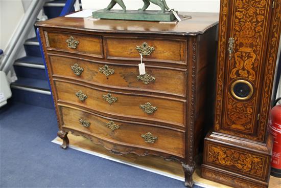 A 19th century Indo Portuguese rosewood serpentine commode, W.4ft 1in.